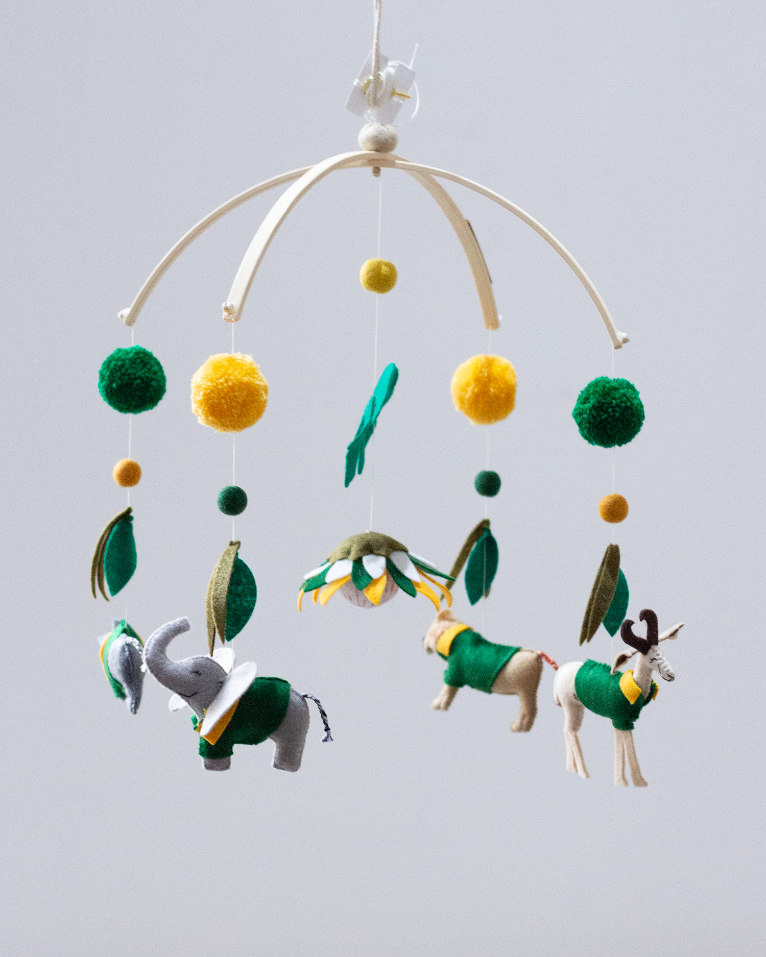 Handmade South African Signature Arch mobile in green and gold with custom wildlife animals and a green & gold Protea