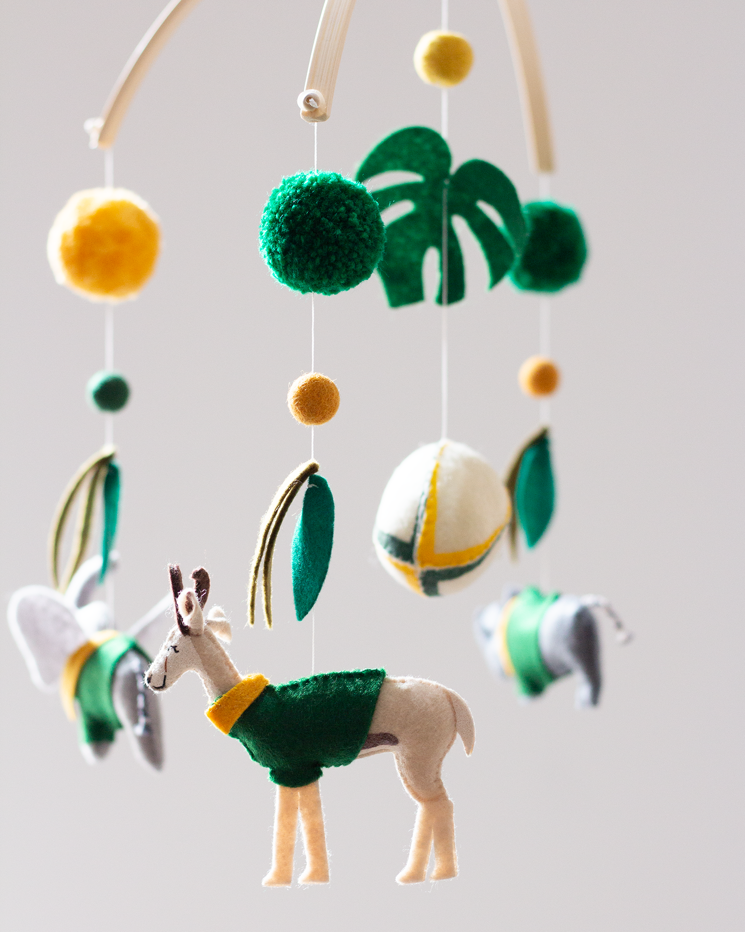 Green and Gold South African wildlife hanging mobile with springboks in supporters jerseys