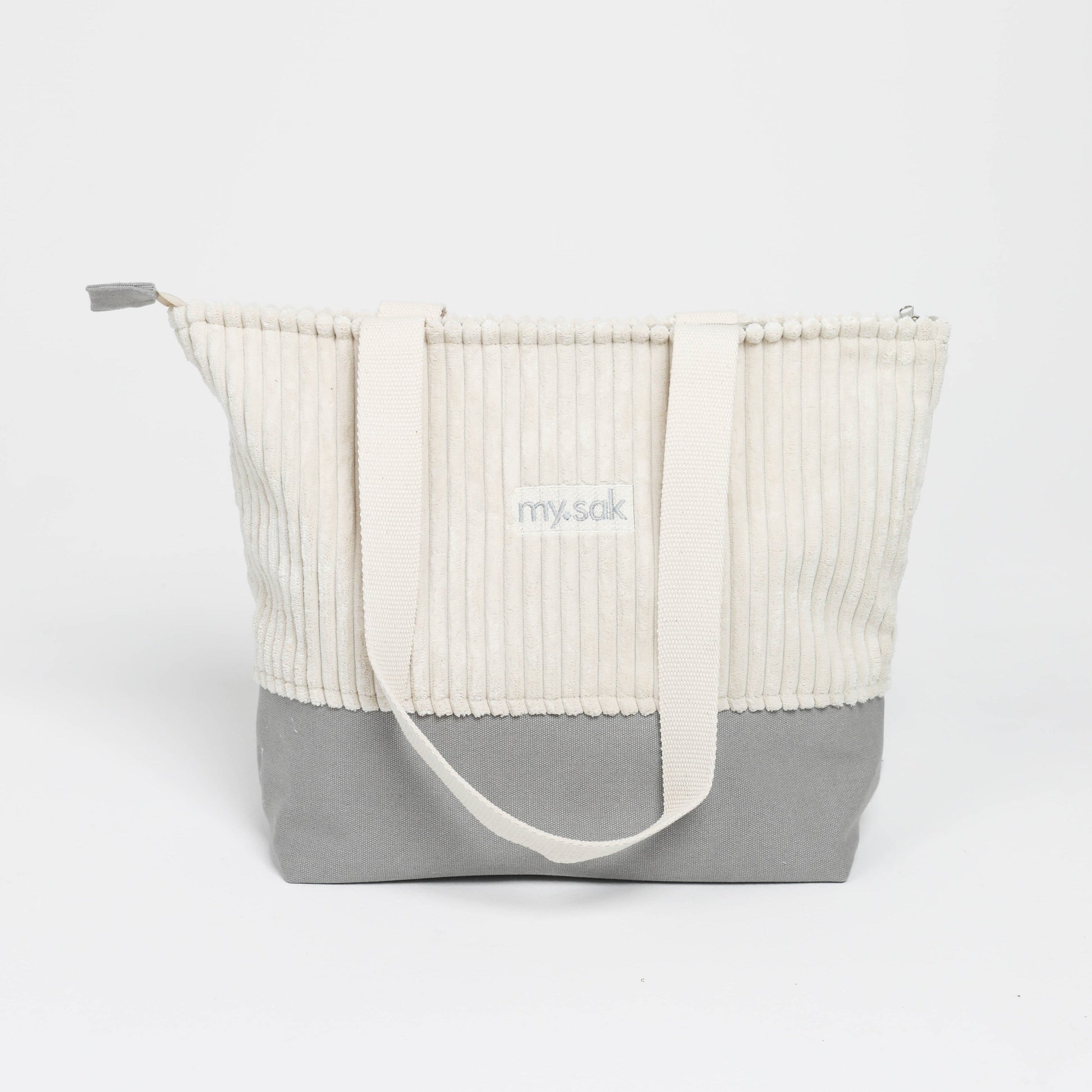 Tote bag with ribbed texture and gray base on a white background