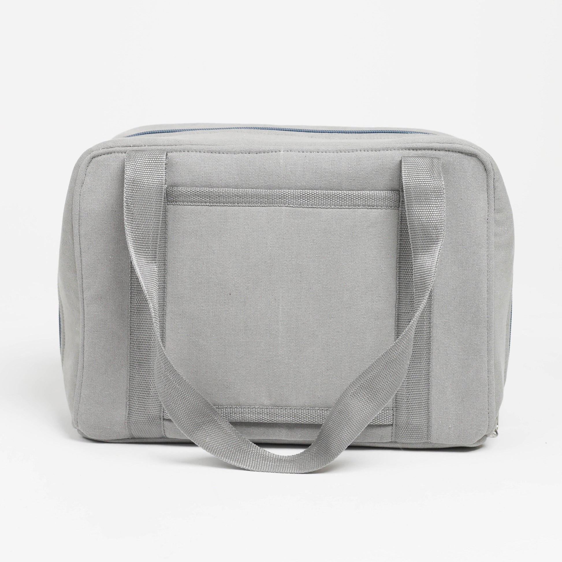 Gray toiletry bag with a handle on a white background